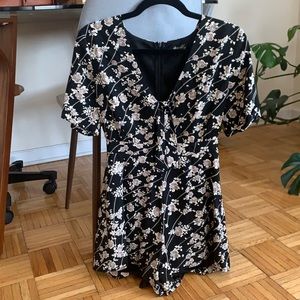 Like new black floral romper with cutout